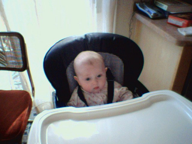 Hanna in her high chair